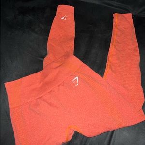 Gymshark size small bright coral color. Worn once.